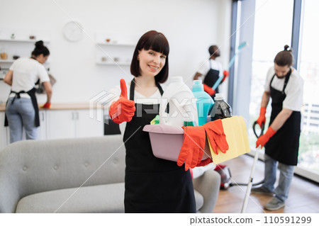 Woman, professional cleaning worker showing thumb up 110591299