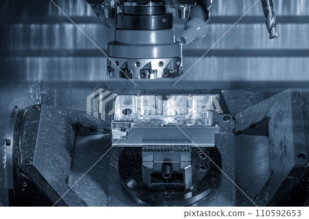 The CNC milling machine rough cutting aluminum parts by face mill tool. The CNC milling machine rough cutting aluminum parts by face mill tool. 110592653