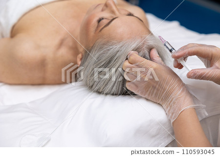 Mature woman having filler injections at beauty clinic Mature woman having filler injections at beauty clinic 110593045