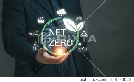 Businessman holds virtual globe with net zero icon. Concept of net zero and carbon neutrality. Reducing greenhouse gas emissions in industry. keeping the world green. Climate pollution global. 110593090