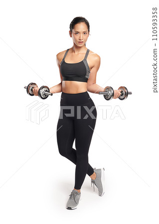 an asian woman is working out with dumbbells wearing the sport exercise suit with white background, an asian woman is working out with dumbbells wearing the sport exercise suit with white background, 110593358