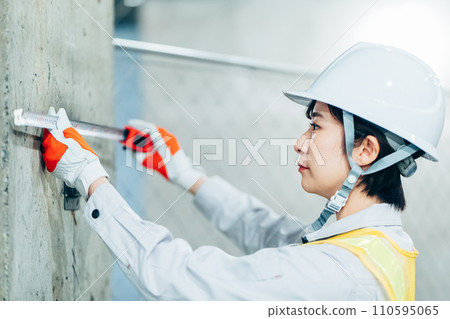 Workers using transceivers at construction sites Workers using transceivers at construction sites 110595065