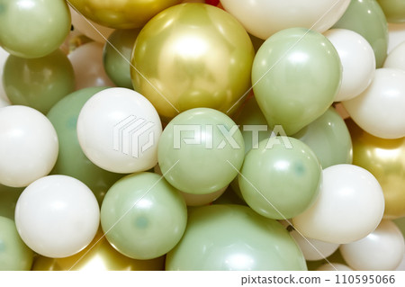 Many white green and gold balloons as background Many white green and gold balloons as background 110595066