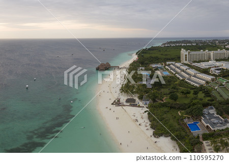 Awesome white sandy beach of Kendwa and turquoise ocean in zanzibar Awesome white sandy beach of Kendwa and turquoise ocean in zanzibar 110595270