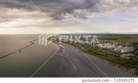 Awesome aerial shot adriatic coastline and Lido Adriano town Awesome aerial shot adriatic coastline and Lido Adriano town 110595275