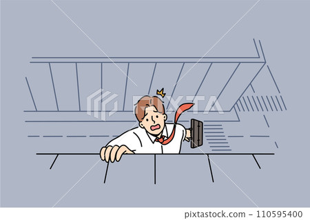 Businessman falls from roof building, trying to hold on and call for help, as metaphor of bankruptcy 110595400