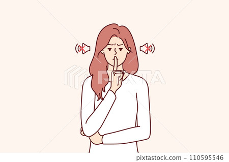 Frowning woman makes tss gesture calling for phones to be turned off or to speak more quietly 110595546