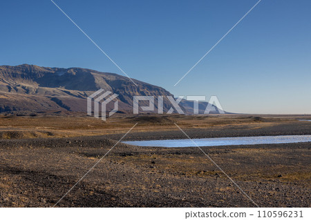 Autumn country and water of fjord, East Iceland 110596231