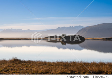 Autumn country and water of fjord, East Iceland 110596239
