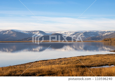 Autumn country and water of fjord, East Iceland 110596240