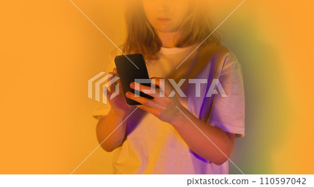 Figure wearing VR glasses experiencing a new virtual world. Figure wearing VR glasses experiencing a new virtual world. 110597042