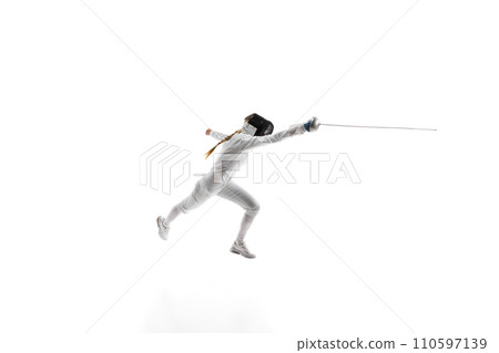 Sports training. An athlete demonstrating the skill and form developed through dedicated sports training. Female fencer in motion over white background Sports training. An athlete demonstrating the skill and form developed through dedicated sports training. Female fencer in motion over white background 110597139