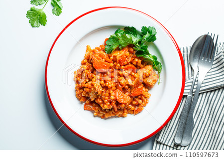 Ptitim with chicken, vegetables and cilantro, white background. Traditional Israeli food. Ptitim with chicken, vegetables and cilantro, white background. Traditional Israeli food. 110597673