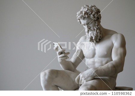 Ancient Greek god sculpture holding a smartphone. Statue of a hero scrolling social media. Doomscrolling, mental health, digital wellness, time loss concept. Bad habits, reading news. Ancient Greek god sculpture holding a smartphone. Statue of a hero scrolling social media. Doomscrolling, mental health, digital wellness, time loss concept. Bad habits, reading news. 110598362