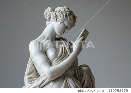 Ancient Greek goddess sculpture holding a smartphone. Female marble statue scrolling social media. Doomscrolling, mental health, digital wellness, time loss concept. Bad habits, reading news. Ancient Greek goddess sculpture holding a smartphone. Female marble statue scrolling social media. Doomscrolling, mental health, digital wellness, time loss concept. Bad habits, reading news. 110598376