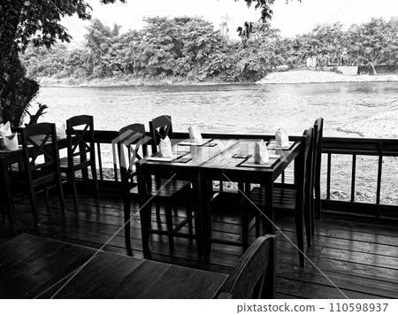 Riverside resort in Vang Vieng, Laos Riverside resort in Vang Vieng, Laos 110598937