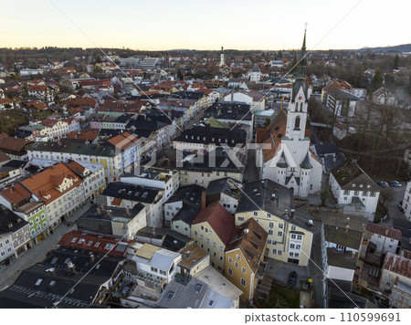 Bad Toelz, Aerial View of Old Houses at Marktstrasse in Altstadt, Bavaria Germany. Bad Tolz in Winter sunrise. Heating Bad Toelz, Aerial View of Old Houses at Marktstrasse in Altstadt, Bavaria Germany. Bad Tolz in Winter sunrise. Heating 110599691