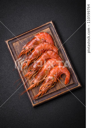 Tiger shrimp or langoustine boiled with spices and salt 110599764