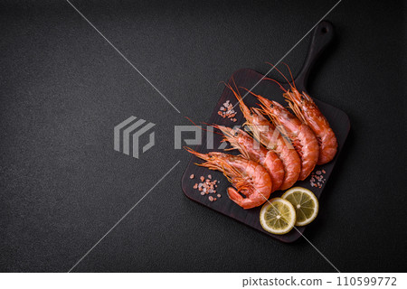 Tiger shrimp or langoustine boiled with spices and salt 110599772