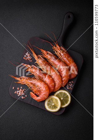 Tiger shrimp or langoustine boiled with spices and salt 110599773