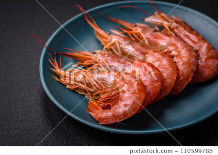 Tiger shrimp or langoustine boiled with spices and salt Tiger shrimp or langoustine boiled with spices and salt 110599786