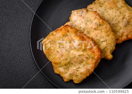 Delicious juicy fried chicken or pork pancakes with salt, spices and herbs Delicious juicy fried chicken or pork pancakes with salt, spices and herbs 110599825