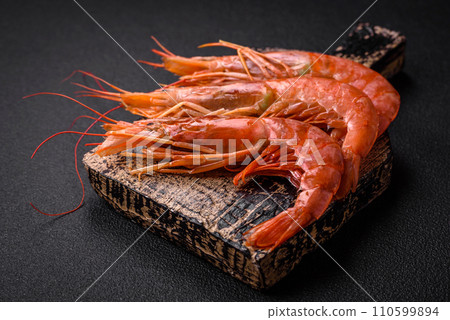 Tiger shrimp or langoustine boiled with spices and salt Tiger shrimp or langoustine boiled with spices and salt 110599894