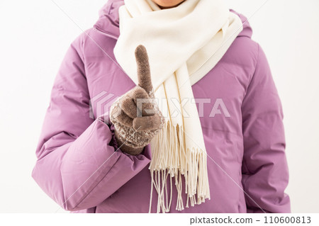 Middle-aged woman wearing winter clothes 110600813