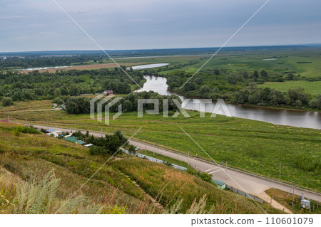 View of Kama River. Mouth of Toima River. Toyma flows into Kama near town Yelabuga, Russia. Summer natural landscape View of Kama River. Mouth of Toima River. Toyma flows into Kama near town Yelabuga, Russia. Summer natural landscape 110601079