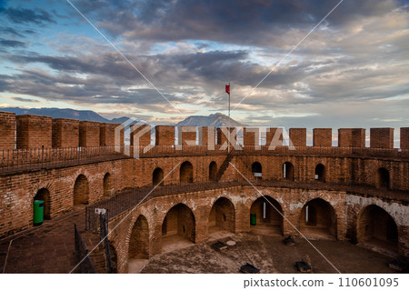 Upper part of the historical Red Tower Kizil Kule, in Alanya Castle. The Red Tower is the symbol of the Alanya city, and the famous touristic place, Turkey 110601095