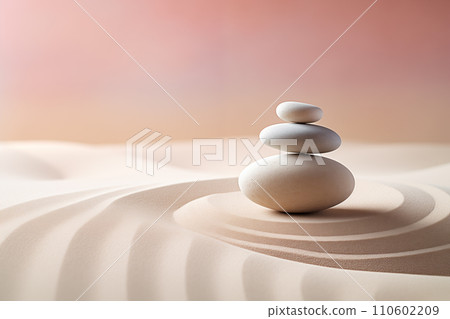 Zen stones stack on raked sand waves in a minimalist setting for balance and harmony Zen stones stack on raked sand waves in a minimalist setting for balance and harmony 110602209