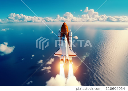 Aerial view of rocket launch at sunrise over ocean coast 110604034