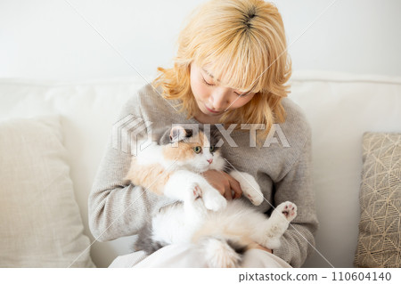 Japanese woman holding a cat 110604140