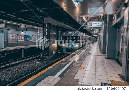Nov 28 2023 Railway Station with Subway Train and Rail Tracks Nov 28 2023 Railway Station with Subway Train and Rail Tracks 110604407