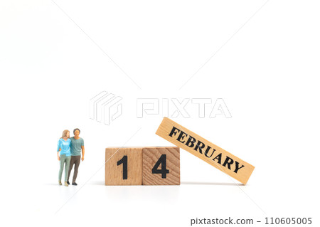 Miniature people man and woman in casual cloth standing together on white background Miniature people man and woman in casual cloth standing together on white background 110605005