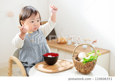 A 1-year-old child eating seven-herb porridge. Fun food education. Five festivals. A 1-year-old child eating seven-herb porridge. Fun food education. Five festivals. 110606351