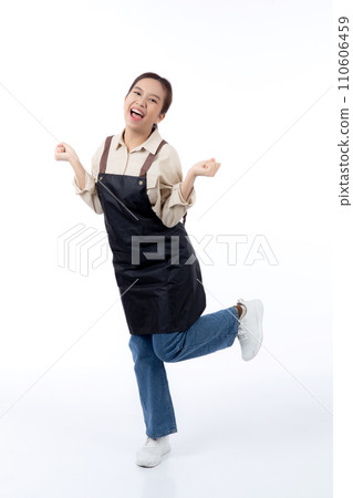 Portrait young asian barista woman wearing apron standing and smile isolated. Portrait young asian barista woman wearing apron standing and smile isolated. 110606459