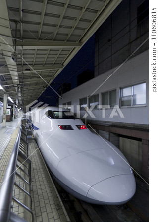 TOKYO - NOV 10,2013: Shinkansen bullet train at Tokyo railway station in November 10,2013 Tokyo, Japan. Shinkansen is world's busiest high-speed railway operated by four Japan Railways companies. 110606815