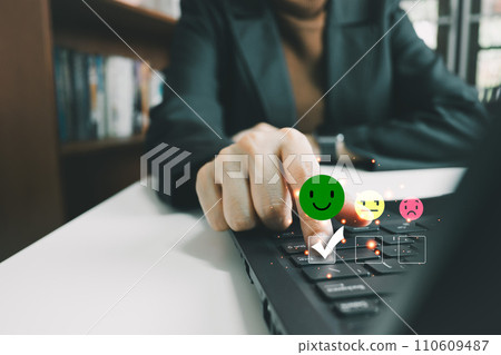 Customers evaluate satisfaction service by laptop, caring and paying attention to service users, satisfy smile icon, giving the highest rating, very good response and feedback from client 110609487