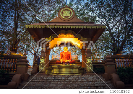 Buddha statue at the entrance to Kaduwela Mahamevnawa Buddhist Monastery 110610562