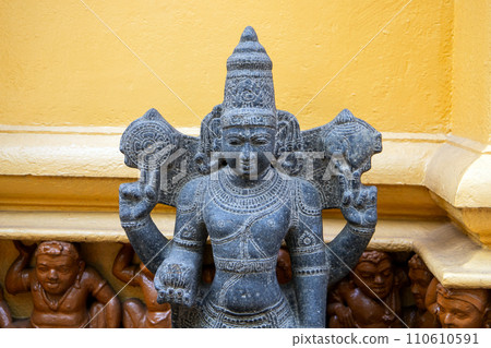 Ancient statue at the entrance of Gangaramaya Temple, Colombo Ancient statue at the entrance of Gangaramaya Temple, Colombo 110610591