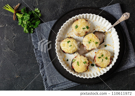 mini eggplant pizzas with tomato sauce and cheese 110611972