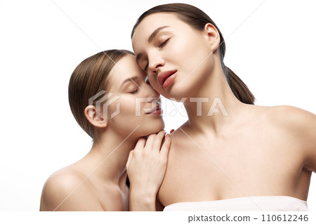 Fashion and Modelling. Portrait of tender, naturally beautiful young ladies. Suitable for fashion industry promotions focusing on natural beauty and minimalism. 110612246