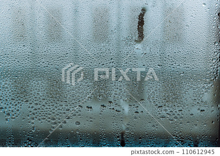 drops on glass house view from window 110612945