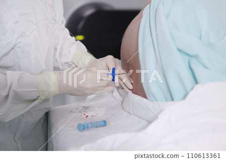 Epidural anesthesia in preparation for vascular surgery. Injections of spinal anesthesia. The concept of healthcare and medicine. 110613361