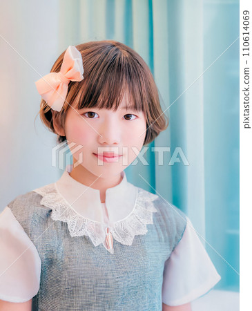 A girl with a short cut wearing a European dress in Tokyo 110614069
