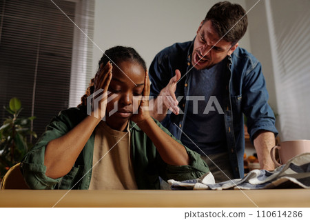 Man shouting at wife during argument Man shouting at wife during argument 110614286