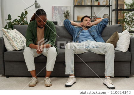 Intercultural couple having quarrel 110614343