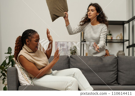 Trying to hit girlfriend with pillow Trying to hit girlfriend with pillow 110614411