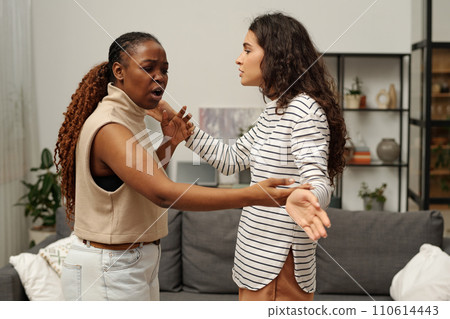 Girls expressing rage during argument 110614443